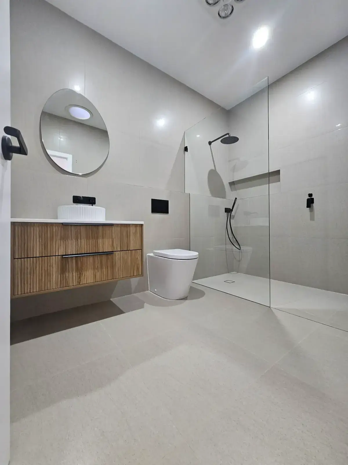 Premium bathroom renovation with fluted timber vanity
