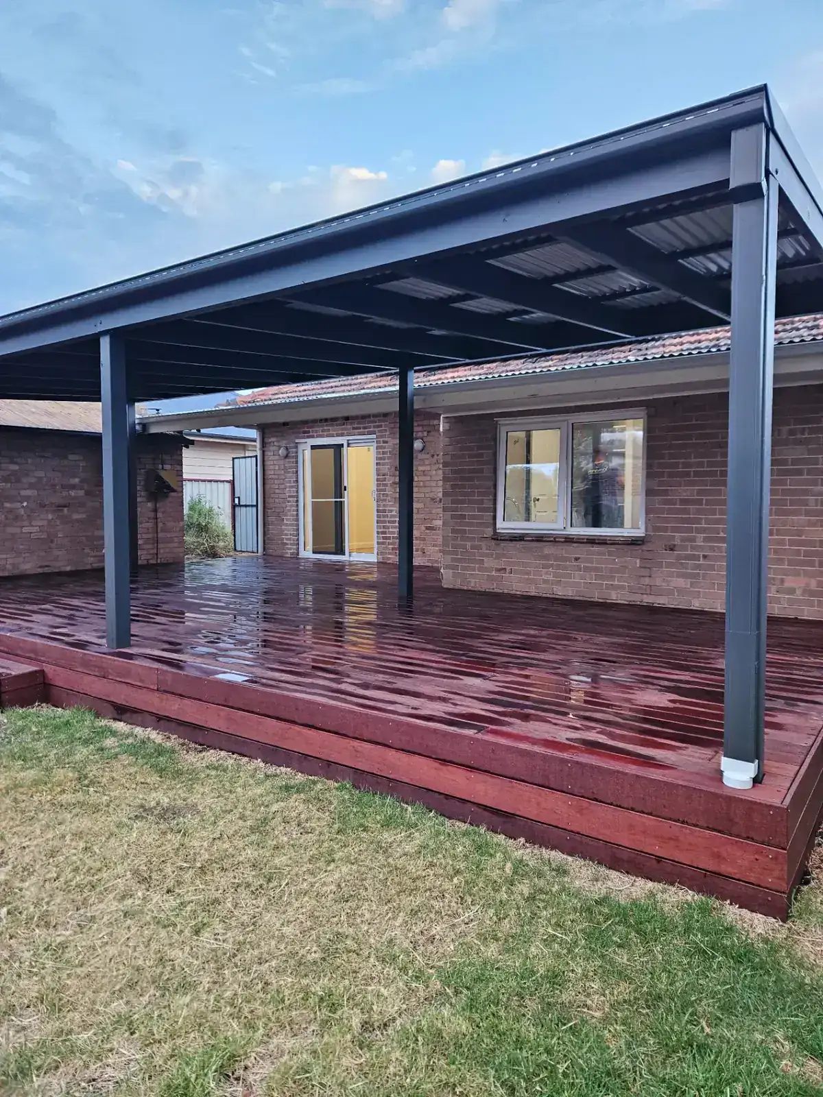 Merbau deck with steel pergola and integrated lighting