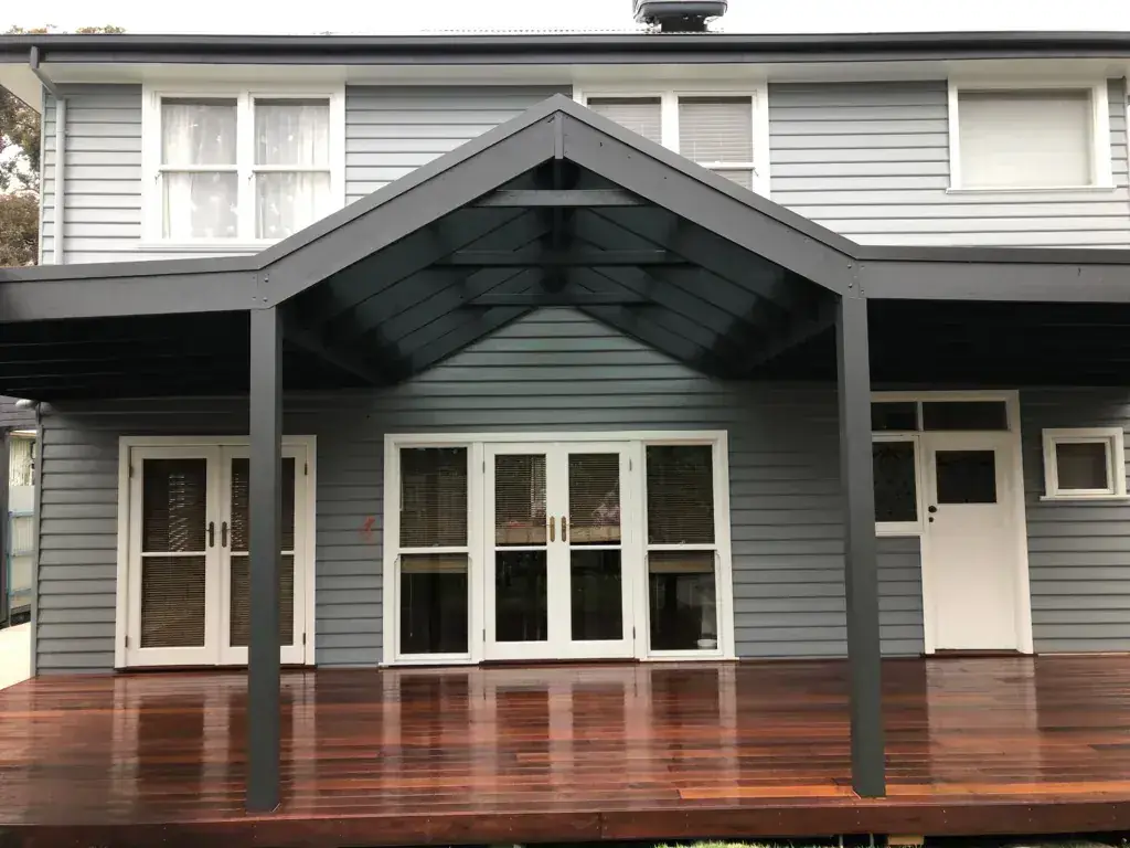 RenoWorx weatherboard home with pergola and deck