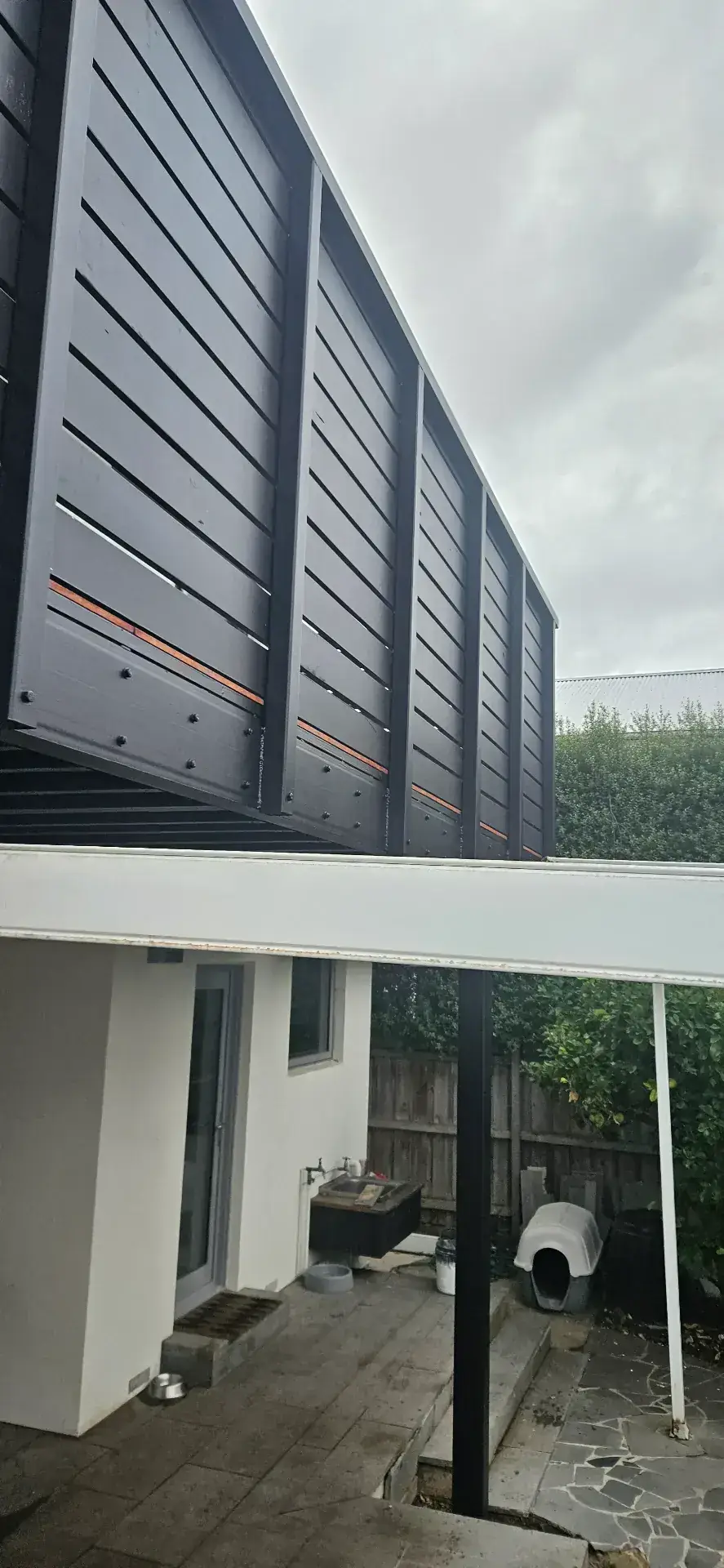 Williamstown rear second-storey with charcoal cladding